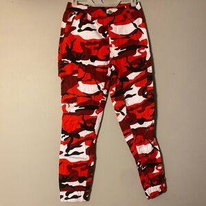 About these for a concert but never wore them. Red, White, and Black cargos